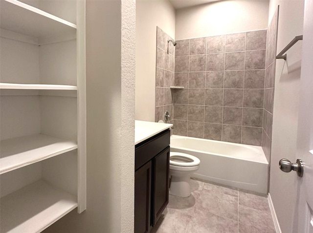 full bathroom with tiled shower / bath combo, vanity, and toilet