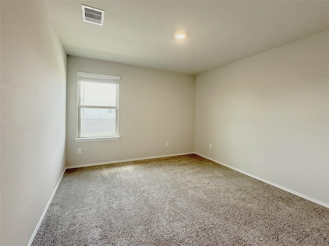 unfurnished room with carpet floors