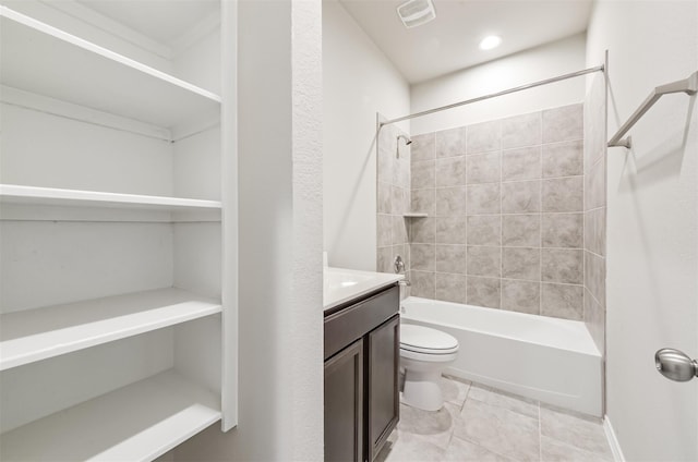 full bathroom featuring toilet, vanity, and tiled shower / bath combo