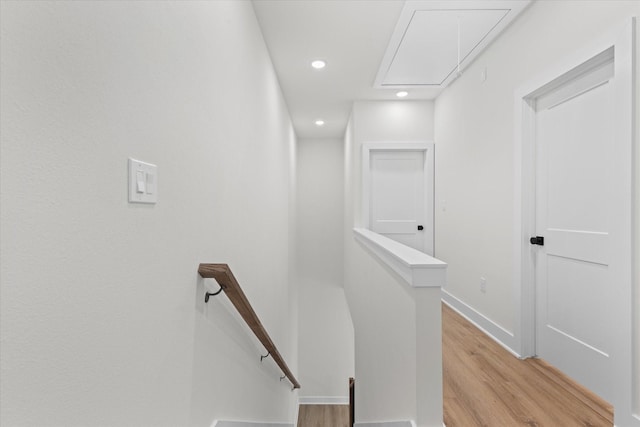 stairway with wood-type flooring