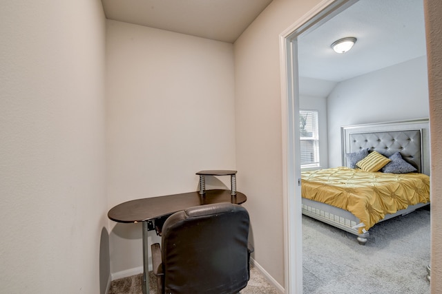 carpeted bedroom featuring vaulted ceiling