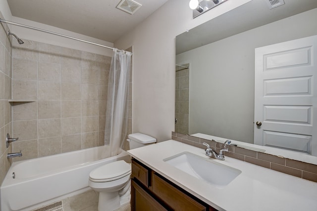 full bathroom featuring toilet, vanity, tile patterned flooring, and shower / bathtub combination with curtain