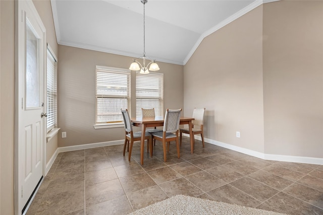 dining room with a chandelier, vaulted ceiling, and ornamental molding