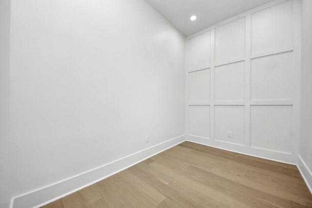 spare room featuring light wood-type flooring