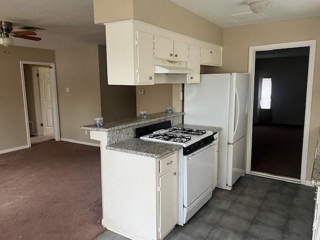 kitchen with white cabinetry, ceiling fan, white appliances, and kitchen peninsula