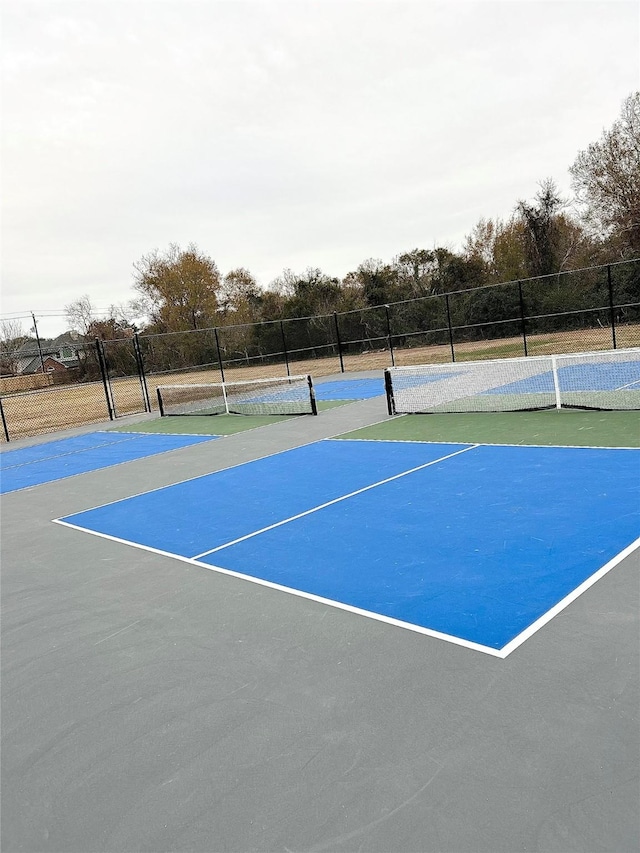 view of tennis court with basketball court