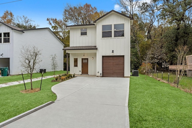 modern farmhouse style home featuring central AC unit, a front yard, and a garage