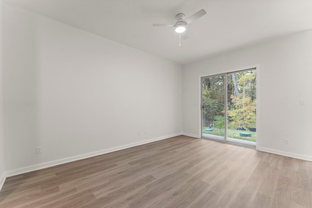 unfurnished room featuring ceiling fan and light hardwood / wood-style floors