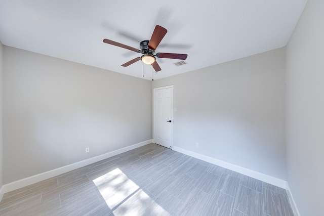 empty room featuring ceiling fan