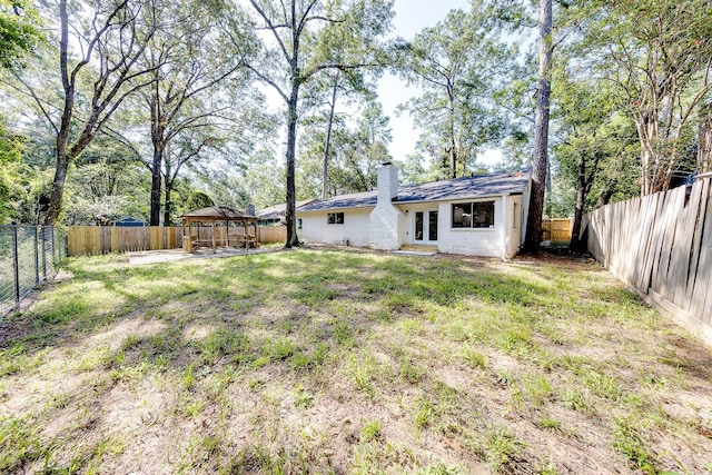 view of yard with a gazebo and a patio