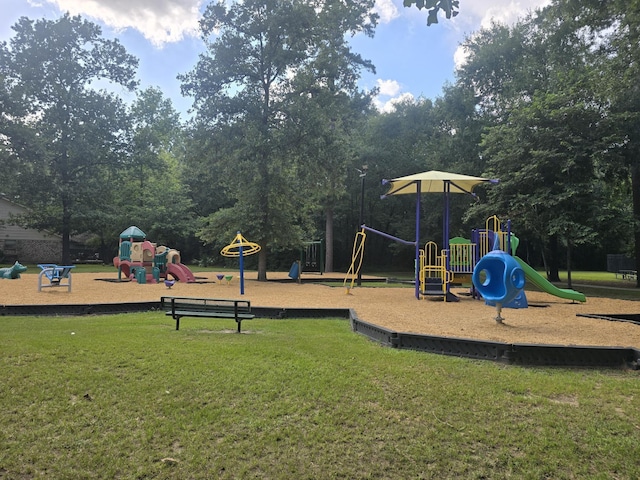 view of jungle gym featuring a yard