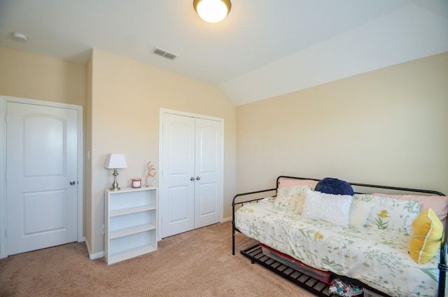 carpeted bedroom with a closet