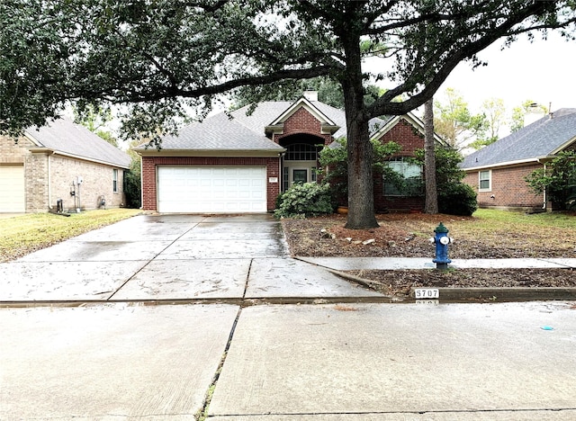 view of front of property featuring a garage