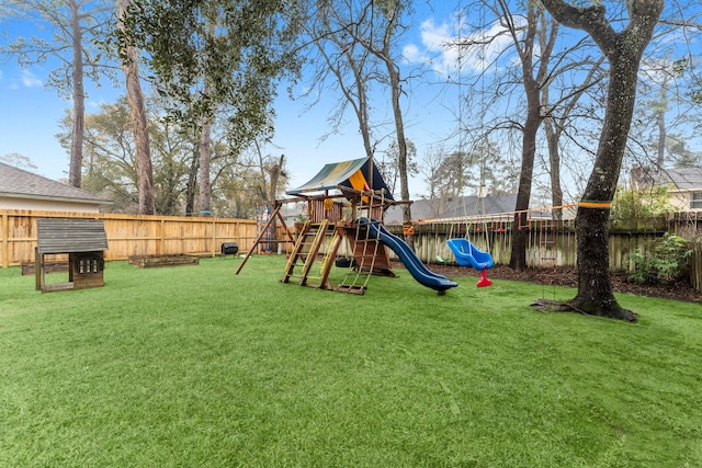 view of jungle gym with a lawn