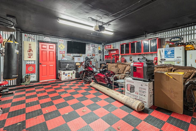 garage featuring a garage door opener