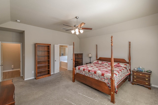 carpeted bedroom with vaulted ceiling and ceiling fan