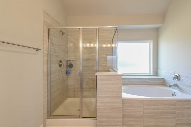 bathroom with independent shower and bath