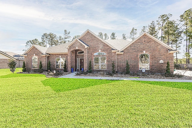 view of front facade with a front yard