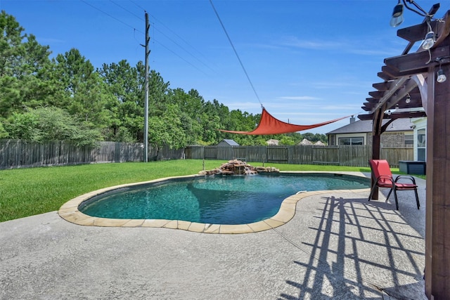 view of pool with a yard and a patio