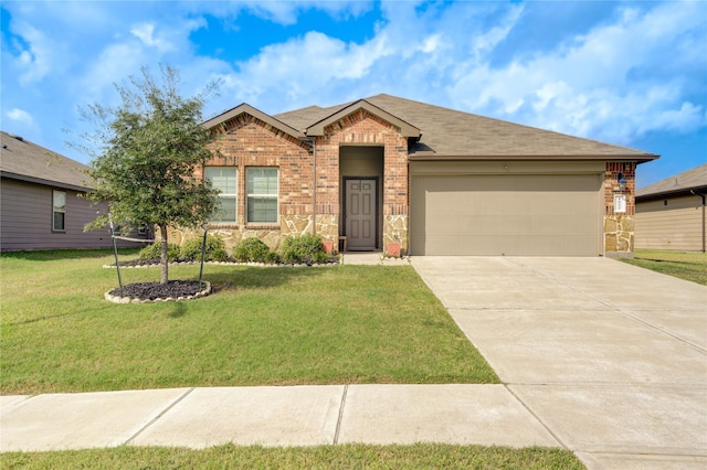 ranch-style house featuring a front yard and a garage