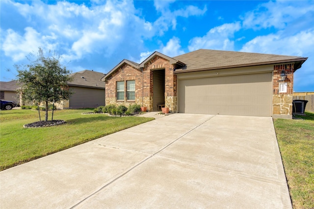 ranch-style home with a garage and a front yard