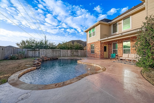 view of pool with a patio area