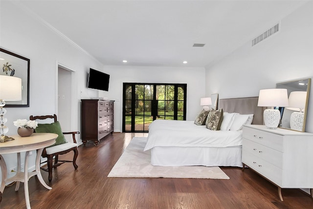 bedroom featuring dark wood-type flooring and french doors