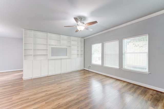 unfurnished living room with ceiling fan, wood-type flooring, and crown molding