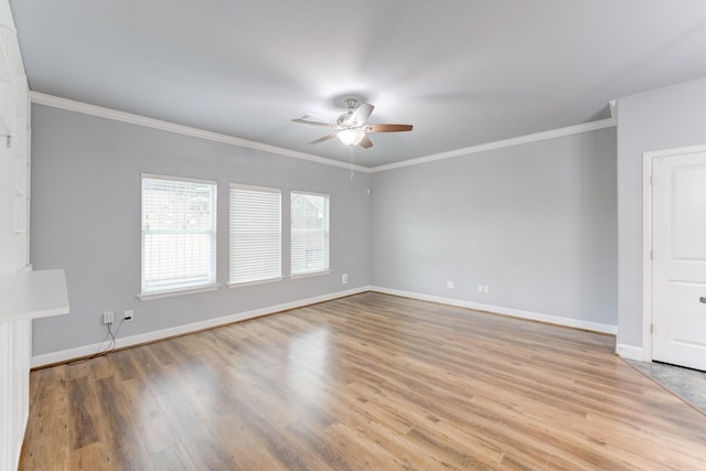 unfurnished room with ceiling fan, ornamental molding, and light hardwood / wood-style flooring