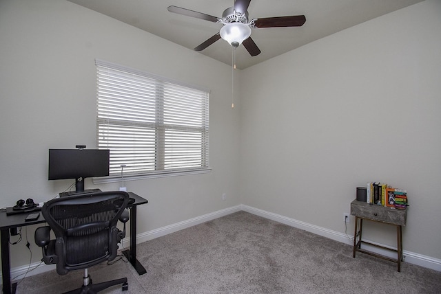 office area with ceiling fan and carpet