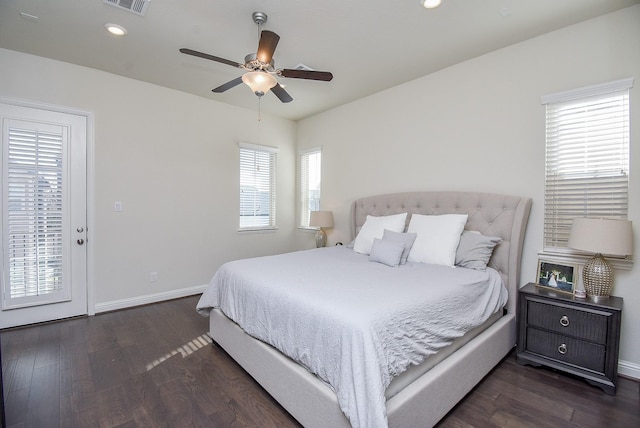 bedroom featuring ceiling fan and dark hardwood / wood-style flooring