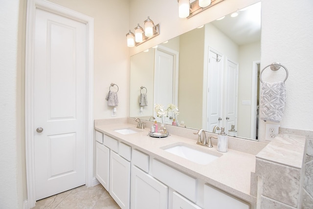 bathroom featuring vanity and tile patterned flooring