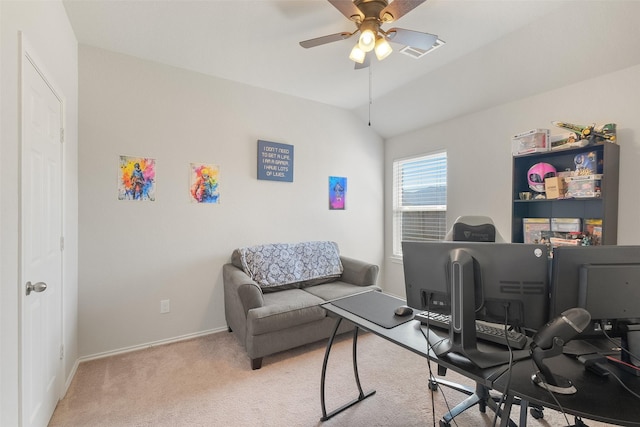 office with ceiling fan, light colored carpet, and vaulted ceiling