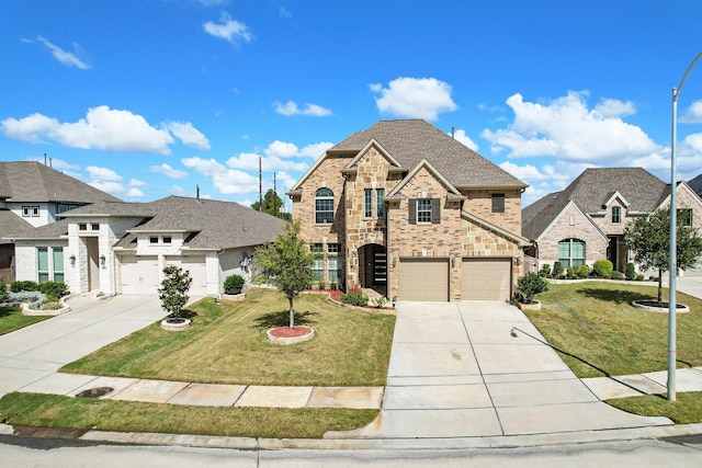 view of front of house with a garage and a front yard