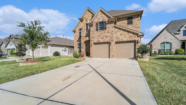 view of front of home with a front lawn and a garage