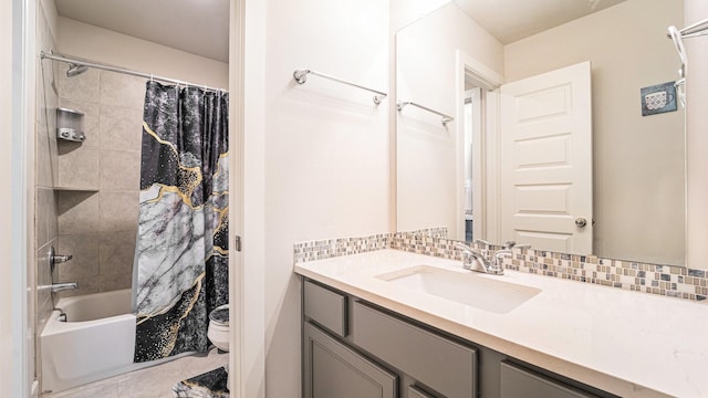 full bathroom with toilet, vanity, tile patterned floors, decorative backsplash, and shower / bath combo with shower curtain