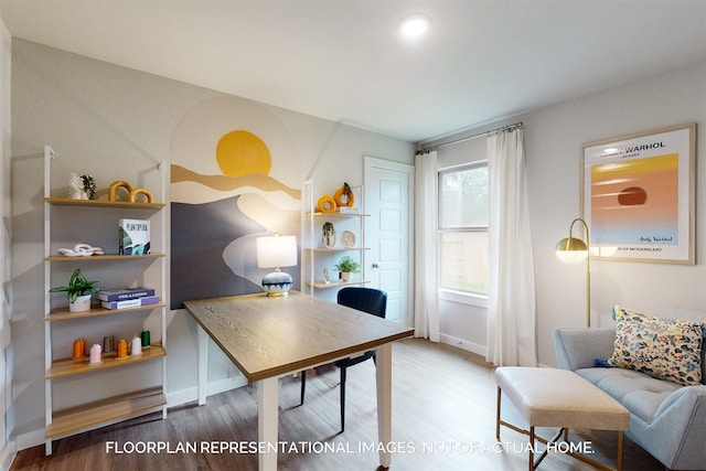 office space featuring wood finished floors and baseboards