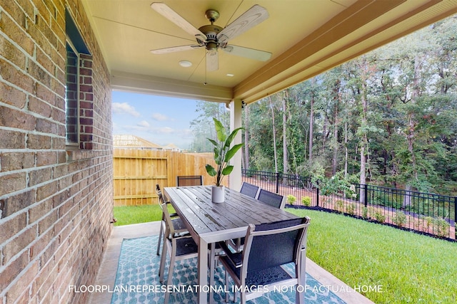 view of patio / terrace featuring ceiling fan, outdoor dining space, and a fenced backyard