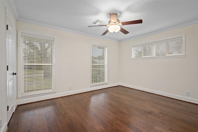 empty room featuring ceiling fan, dark hardwood / wood-style flooring, and ornamental molding