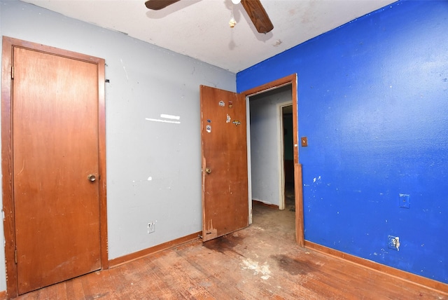 spare room featuring ceiling fan and light hardwood / wood-style flooring