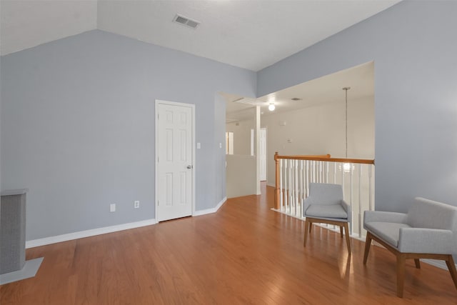 unfurnished room featuring hardwood / wood-style flooring