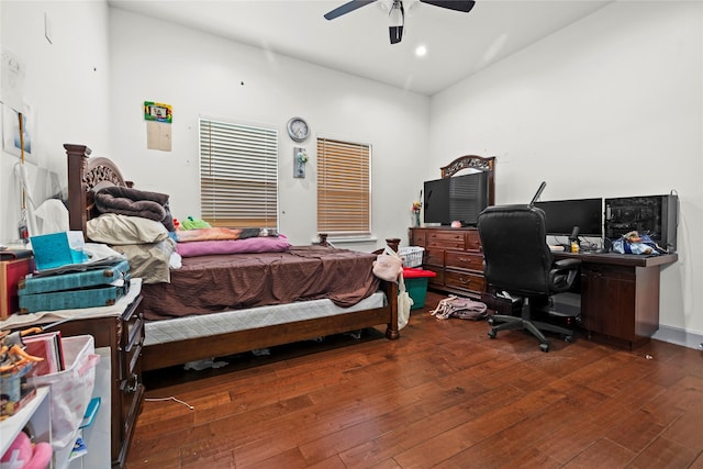 bedroom featuring ceiling fan and dark hardwood / wood-style flooring