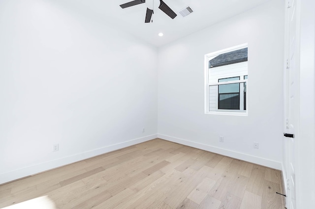 unfurnished room featuring ceiling fan and light wood-type flooring