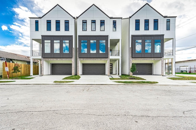 view of front of property featuring a garage