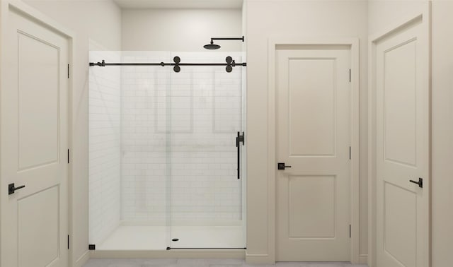 full bathroom featuring a stall shower