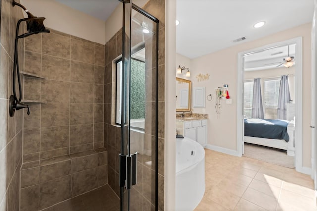 bathroom with vanity, separate shower and tub, and tile patterned floors