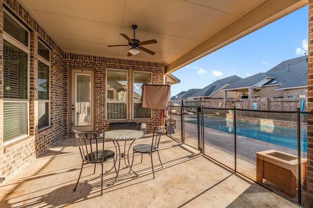 balcony featuring ceiling fan and a patio