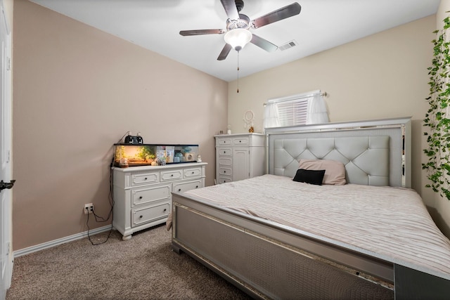 bedroom featuring light colored carpet and ceiling fan