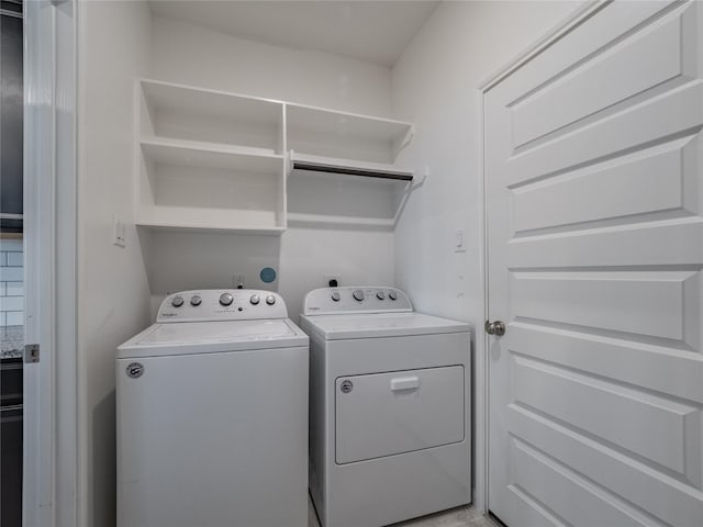 laundry area featuring independent washer and dryer