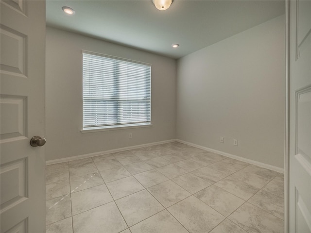 view of tiled spare room